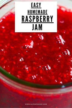 raspberry jam in a glass jar with the words easy homemade raspberry jam