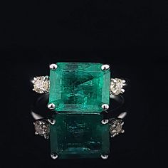 Gorgeous vintage platinum engagement ring gem natural green emerald in emerald shape Center emerald weight 4.47ct. size 10.6x8.5mm gorgeous green color nice luster very lively ,brilliant spakly and clean. side two natural diamonds total weight 0.20ct. J -SI1 ring size 7 Resizable Appraisal available Retail value $9,500 net. Luxury Green Emerald Ring With Diamond Cut, Gia Certified Green Diamond Ring For Formal Occasions, Formal Octagon Emerald Diamond Ring, Gia Certified Formal Emerald Cut Emerald Ring, Formal Emerald Cut Emerald Ring With Vvs Clarity, Formal Solitaire Emerald Ring With Princess Cut, Formal Princess Cut Solitaire Emerald Ring, Formal Octagon Solitaire Emerald Ring, Gia Certified Octagon Emerald Ring