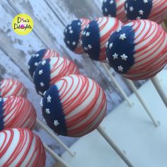 red, white and blue cake pops with stars on them are ready to be eaten