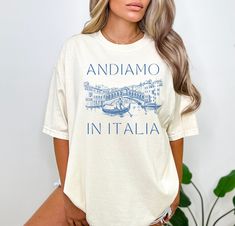 Travel to Italy in style in this beautiful Italian Comfort Colors shirt.  Want a different design or color? Just let us know and we'll make it happen!  FIT & SIZING: * These beautiful and trendy Comfort Colors t-shirts bring extra coziness to your wardrobe, while the relaxed fit makes them an excellent daily choice.  * Comfort Colors shirts are made in the USA. * Please see the size chart in the photos to obtain an accurate size. Measure one of your favorite tees for comparison! * Ladies: These Italian Blackshirts, Italy T Shirt Ideas, Italian T Shirts, Italia Shirt, Portofino Shirt, Italian Shirts, Bid Day Shirts, Shirt Mockup, Snug Fit