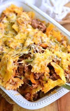 a casserole dish filled with meat and cheese