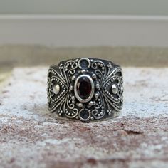 Vintage Sterling Silver Garnet Dome Ring ...Marked 925...Total of weights 5.5gramsMeasure of Face 15.1MM...It's in very good condition. Antique Silver Garnet Rings, Dot Ring, Solitaire Rings, Coral Ring, Dome Ring, Domed Ring, Natural Turquoise, Red Coral, White Topaz