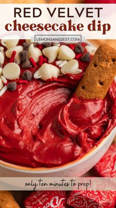 red velvet cheesecake dip in a white bowl with chocolate chips and graham crackers