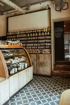 the inside of a store with many jars on display