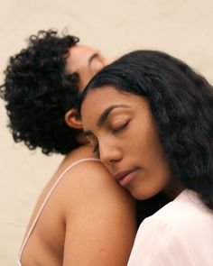 two women are sleeping next to each other