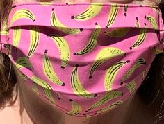 "Reversible face mask - bananas fabric on one side and a coordinated black gingham check on the reverse - super versatile. Pleated face mask -100% cotton - Handmade - Reusable & Washable. Secures to the face by elastic ear straps. SHIPPING by USPS First Class Mail. The fabric print placement and inside lining may vary in each mask. Washable and reusable. I have been a lifelong quilter, and use the same construction techniques to make these masks. My masks are super durable, washable, and bui Banana Print, Go Bananas, Black Gingham, Fabric Print, Gingham Check, One Sided, Bananas, Gingham, The Face