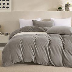 the comforter is made up and ready to be used in this bedding set