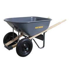 a black wheelbarrow with two wooden handles