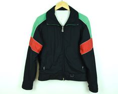 Bogner Women's Ski Jacket  Insulated. Windbreaker Material:  Shell: 100%Nylon Lining:100% Nylon Interfill: 100% Polyester Condition: Good used condition! Has small mark on elbow. Colour: Black, Red, Green. (Due to the quality differentiation between different monitors, the picture may not reflect the actual color of the item.) Size: US 6/ EUR 38/ UK 10 Please be careful relying on the size, best to compare these measurements with a piece of clothing that you already own.  Bust (from armpit to ar Sporty Nylon Windbreaker For Winter Sports, Sporty Nylon Track Jacket For Winter Sports, Black Outerwear For Ski Season, Casual Nylon Outerwear For Skiing, Sporty Red Skiing Outerwear, Red Sporty Outerwear For Skiing, Sporty Outerwear For Ski Season, Casual Red Skiing Outerwear, Red Casual Outerwear For Skiing