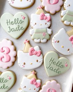 hello kitty cookies are arranged on a tray