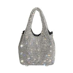 "Take a look at this stunning Bucket bag that shines like the stars on a clear night! It's crafted by hand using top-notch materials and embellished with rhinestone crystals. This bag brings a touch of sophistication and style to your attire, making you the center of attention at any event. You can wear it as a clutch or hands-free, thanks to its detachable silver chain strap - enabling you to personalize your look to your liking. ✦ High-quality rhinestone ✦ Polyester lining ✦ 1 x Silver Crossbody chain strap ✦ Magnetic closure ✦ 5.5\" W x 6.6\" H x 5.5\" D     14cm W x 17cm H x 14 cm D" Cristal Bag, Night Out Bag, Crystal Bags, Plaid Blanket Scarf, Club Kids, Vintage Crewneck, Wedding Bag, Evening Clutch, Color Block Sweater