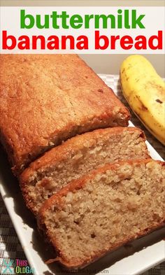 sliced banana bread sitting on top of a white plate next to a banana and another banana