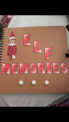 an elf's book with the words elf memories written on it