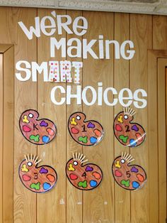 there is a sign on the door that says we're making smart choices with hearts and hands