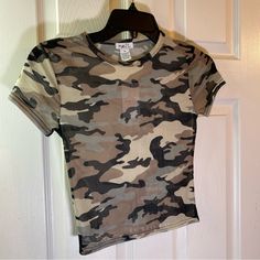 Rue 21 Women Xs Top Shirt Camo Sheer See Through Sexy Army Spandex Stretch Relax Brand New With Tags. Measurements Are In The Pictures. Only Usa Shipping And No International Shipping. Will Ship With In 3 Business Days After Payment Has Been Made. I Do Combine/Bundle Shipping. I Do Use Recycled Shipping Items To Stay Eco Friendly For Our Beautiful Earth. Please Leave Positive Feedback, And I Will Return Positive Feedback For Better Customer Satisfaction, Thanks. Trendy Summer Camouflage Top, Trendy Camouflage Summer Top, Trendy Camouflage Tops For Summer, Trendy Camouflage T-shirt For Summer, Summer Stretch Camouflage Tops, Fitted Camouflage Tops With Short Sleeves, Camouflage Fitted Short Sleeve Tops, Fitted Camouflage Short Sleeve Tops, Spring Stretch Camouflage Top