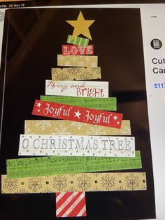 a christmas tree made out of different types of paper