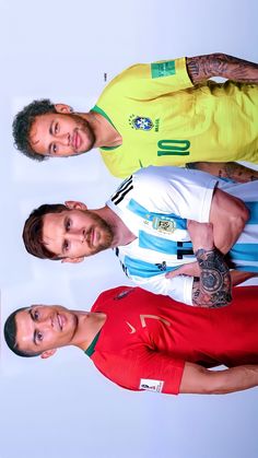 three men standing next to each other with tattoos on their arms