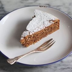 a piece of cake on a plate with a fork