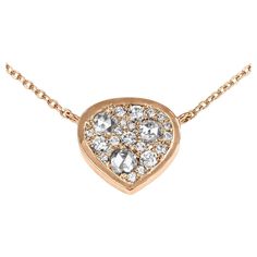 Unveil the beauty of Belgian craftsmanship with this handmade Rose gold pendant Necklace, featuring Natural white fancy shape rose-cut diamonds and white Brilliant-cut diamonds. Unlike mass-produced pendants, Joke Quick’s creations are entirely handcrafted, avoiding any casting or printing techniques. Each gem is carefully hand-set in our signature mosaic setting, offering a seamless, glittering spectacle. This design creates a remarkable texture and a subtle spectrum of whites, offering an intriguing visual appeal. Pendant necklace: 18K Rose gold 3.9  g. 21 X Natural white brilliant-cut diamonds DEGVVS : 0.25 ct. 3 X Natural white GHVS rose-cut diamonds 0.26  ct.. Total Carat diamonds: 0.51  ct. Total weight: 6.92 g Pendant measurements: width: 12 mm/ 0.472 inches length: 12 mm/ 0.472 inc Rose Gold Pendant Necklace, Handmade Rose, Pave Pendant, Rose Gold Pendant, Rose Cut Diamond, Gold Pendant Necklace, Brilliant Cut Diamond, 18k Rose Gold, Printing Techniques