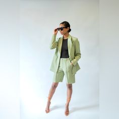 Our Blazer-And-Bermuda Set Is Made With Comfortable Stretch Crepe Fabric, Giving You The Versatility To Dress Up Or Down Depending On The Occasion. Color: Pistachio Green Self: 96% Polyester 4% Spandex Lining 1: 100% Polyester Lining 2: 100% Rayon Spring Fitted Bermuda Shorts For Workwear, Elegant Fitted Bermuda Shorts For Spring, Fitted Cotton Bermuda Shorts For Work, Fitted Bermuda Shorts For Spring Day Out, Chic Fitted Bermuda Shorts For Work, Tailored Shorts For Workwear In Spring, Tailored Workwear Shorts For Spring, Knee-length Fitted Shorts For Workwear, Fitted Bermuda Shorts For Summer Workwear