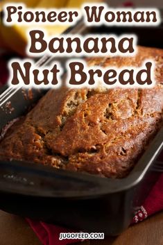 a loaf of banana nut bread in a pan with a knife and fork on the side