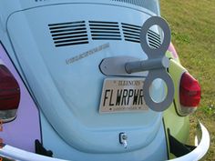 a close up of the tail end of a car with a license plate on it