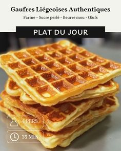 three waffles stacked on top of each other in front of the words plate du jour