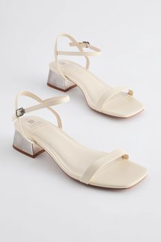 These gorgeous low heel sandals have a square open toe with smooth faux leather straps and an adjustable ankle strap, a Forever Comfort cushioned footbed and a square heel sole, finished in an extra wide fit. Upper - Other Materials, Lining & Sock - Other Materials, Sole - Other Materials. Short Sandal Heels, Simple White Heels Short, Short Heels For Wedding, Short Heels For Prom, Cute Short Heels, Prom Shoes Low Heeled, Short High Heels, Formal Sandals