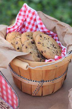 a basket filled with cookies sitting on top of a table