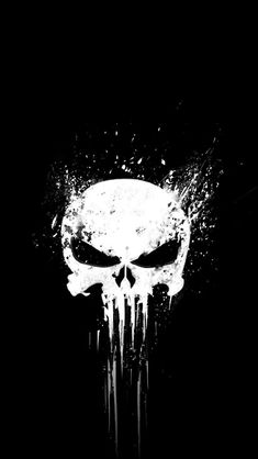 a black and white image of a skull with water splashes on it's face