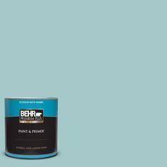 the behr paint is light blue and has a green base with white lettering on it