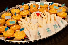 a tray filled with lots of food on top of a table