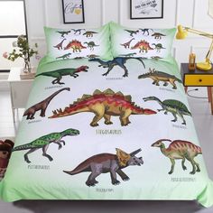 a bed with dinosaurs printed on it