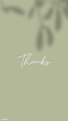 the word thanks written in white ink on a green background with an image of leaves