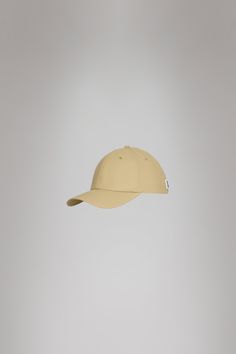 Cap is Rains' take on the classic baseball cap with 6 panels and curved brim. The Cap is characterized by a curved brim and six-paneled design held in place by a back-mounted adjustable webbing strap and buckle. It features eyelets to ensure ventilation for breathable comfort. Cap is cut from Rains' signature PU fabric. The finish is lightweight with a smooth feel. Adjustable Sporty Baseball Cap With Curved Visor, Classic Adjustable Dad Hat With Curved Visor, Classic Adjustable Baseball Cap With Curved Brim, Outdoor Snapback Hat With Curved Visor, Classic Baseball Cap With Adjustable Fit And Curved Brim, Classic Adjustable Hat With Curved Visor, Adjustable Baseball Cap With Curved Visor, Classic Curved Visor Baseball Cap For Outdoor, Classic Outdoor Baseball Cap With Curved Visor