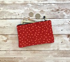 This cute coin purse pouch is handmade by us using a red polka dot heavy cotton fabric, interior is lined with 100% cotton. Pattern placement will vary. Use as a coin purse, wallet, organizer pouch, or whatever you'd like! This is made to order. Measurements: 5 inches wide. 3 inches high. Thank you for your support! Care: Spot clean with damp rag, air dry. Wallet Organizer, Cute Coin Purse, Pouch Organizer, Red Polka Dot, Purse Pouch, Zip Pouch, Small Wallet, Valentine Gift, Christmas Birthday