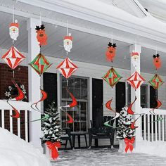 christmas decorations on the front porch of a house