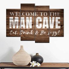 a wooden sign that says welcome to the man cave eat, drink and be lazy