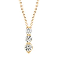 Crafted in quality 14 karat yellow gold  three brilliant round diamonds  at approximately 1.01 carats total weight  were hand-matched for consistent sparkle and fire. The pendant measures 5/8 of an inch long and hangs from a matching 22-inch adjustable cable chain. Elegant Three Stone Diamond Necklace, Elegant Three-stone Round Cut Diamond Necklace, Formal Three Stone Round Diamond Necklace, Elegant Gold Three Stone Necklace, Elegant Gold Three-stone Necklace, Yellow Gold Three Stone Diamond Necklace For Anniversary, Classic Gold Three Stone Necklaces, Classic Three Stone Diamond Necklace, Formal Three Stone Round Cut Diamond Necklace