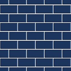 a blue brick wall that is made out of several different bricks and has white lines on it