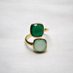 D E T A I L S - Material: Sterling SilverStone: Aqua chalcedony & Green ChalcedonyThe fit: True to US ring size Finish: Smooth and gold-filled to a high shineUpgrade your accessory collection today with this must-have piece, & flaunt your style statementS H I P P I N G & P R O D U C T I O N - My current production time is 2-6 business days, which means after those days are up, your order ships! I make everything custom to order, by hand, but I promise you it's worth the wait!R U S H Hippy 70s, Aqua Chalcedony Ring, Ring Wrap, Ring Proposal, Spiral Ring, Chalcedony Ring, Green Chalcedony, Aqua Chalcedony, Wrap Ring