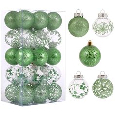 green christmas ornaments are in a clear box