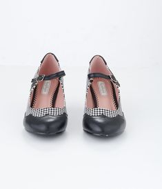 These adorable 1950s style Mary Janes are crafted in a black and white check fabric upper, and accented with a black leatherette toe and heel. Complete with 2.5 inch heels, and buckle adjustable strap Available while supplies last. Short Heels, Check Fabric, 5 Inch Heels, Mary Jane Heels, 1950s Fashion, Mary Janes, Unique Vintage, Adjustable Straps, Buckle