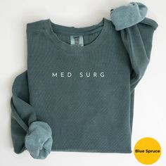 Comfort colors Med Surg Nurse Sweatshirt  Personalized MedSurg Department Shirt MedSurg Department Sweatshirt  Med Surge Nurse Gift ✦ KEY FEATURES Comfort Colors 1566 UNISEX (NOT WOMEN'S SIZE) relaxed fit, medium-heavy fabric sweatshirt. Made from 80% ring-spun cotton, 20% polyester. For an oversized look, please go up 2 or 3x your normal size according to your needs. ✦ SIZING Please refer to the sizing chart in the pictures above to find your perfect fit. ✦ RETURNS AND EXCHANGES Not accepted. A Med Surg Nurse Shirt, Med Surge, Med Surg Nurse, Nurse Accessories, Med Surg Nursing, Med Surg, Nursing Accessories, Nurse Sweatshirt, Nurse Shirt