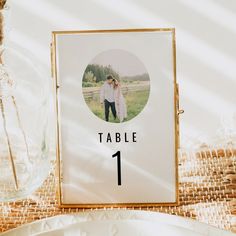 a table number with a photo on it