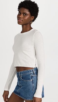 SLVRLAKE Long Sleeve Crop Baby Tee | SHOPBOP Crew Neck Long Sleeve Cotton Top With Thumbholes, Cotton Long Sleeve Crew Neck Top With Thumbholes, Cotton Long Sleeve Top With Thumbholes And Crew Neck, White Long Sleeve Top With Thumbholes For Spring, Basic Cotton Long Sleeve Top, Long Sleeve Cotton Tops With Thumbholes, Cotton Long Sleeve Tops With Thumbholes, Fitted White Cotton Long Sleeve Top, White Fitted Cotton Long Sleeve Top