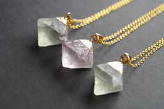 You will receive (1) fluorite necklace. Size approx : 25mmx15mmx25mm The chain is 18 carat gold filled. Please select your length at checkout. You necklace will come in a gift box or a gift bag ready for gifting.  Feel free to contact me if you have any questions. Fluorite Pendant Necklace For Gift, Handmade Fluorite Necklaces For Gift, Fluorite Necklace, Green Pendant, Green Pendants, Green Fluorite, Gold And Green, Purple And Green, Necklace Size