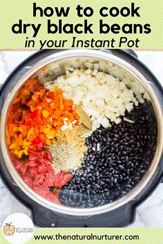 an instant pot filled with black beans, carrots and other ingredients to cook in