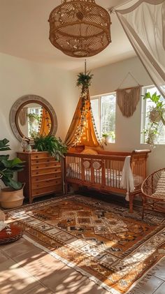 a baby crib in the middle of a room with two round mirrors hanging from the ceiling