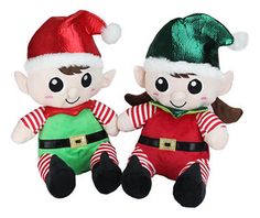 two stuffed toys are dressed up as elves